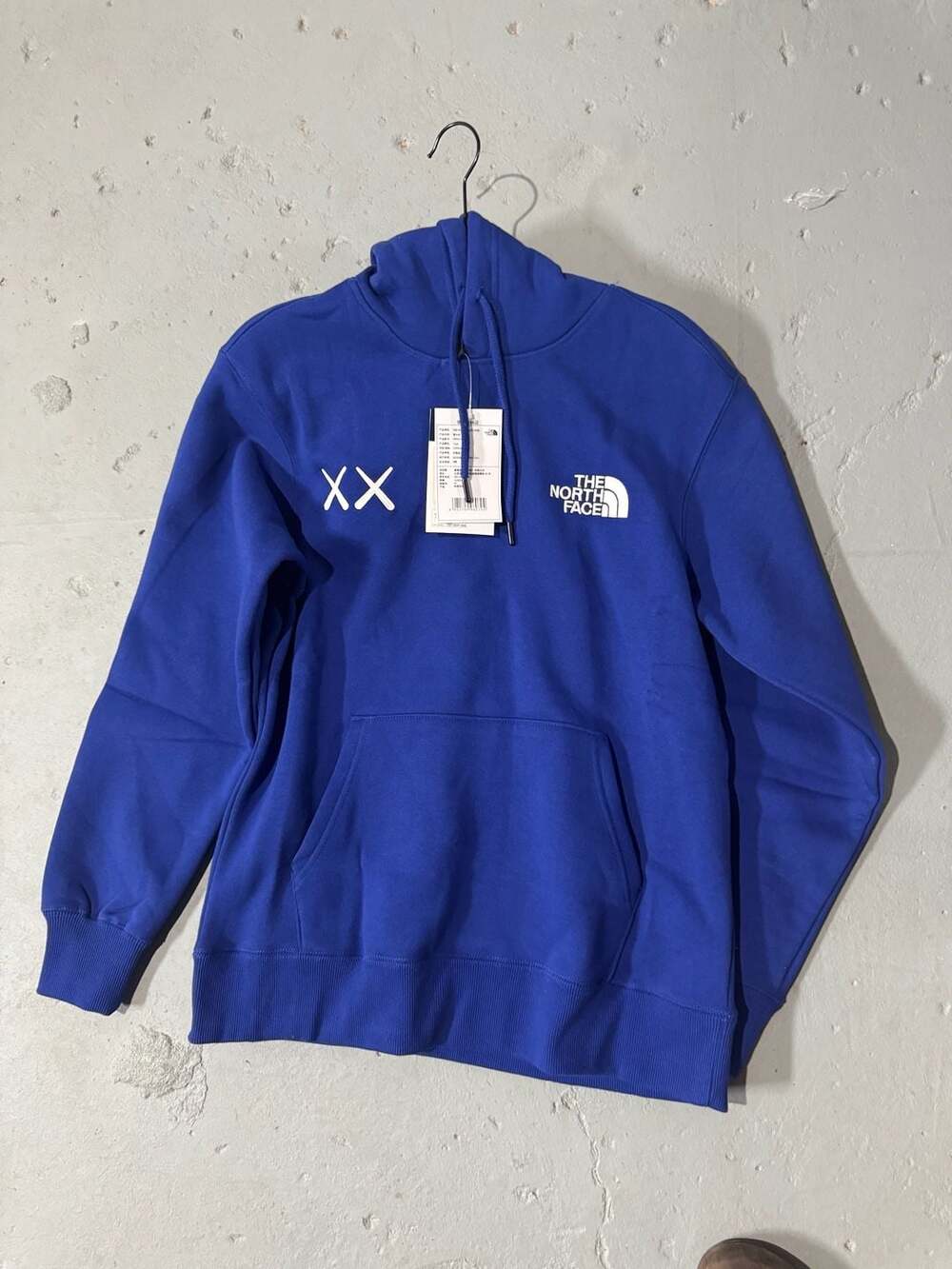 The North Face x KAWS Pullover Hoodie in Bolt Blue